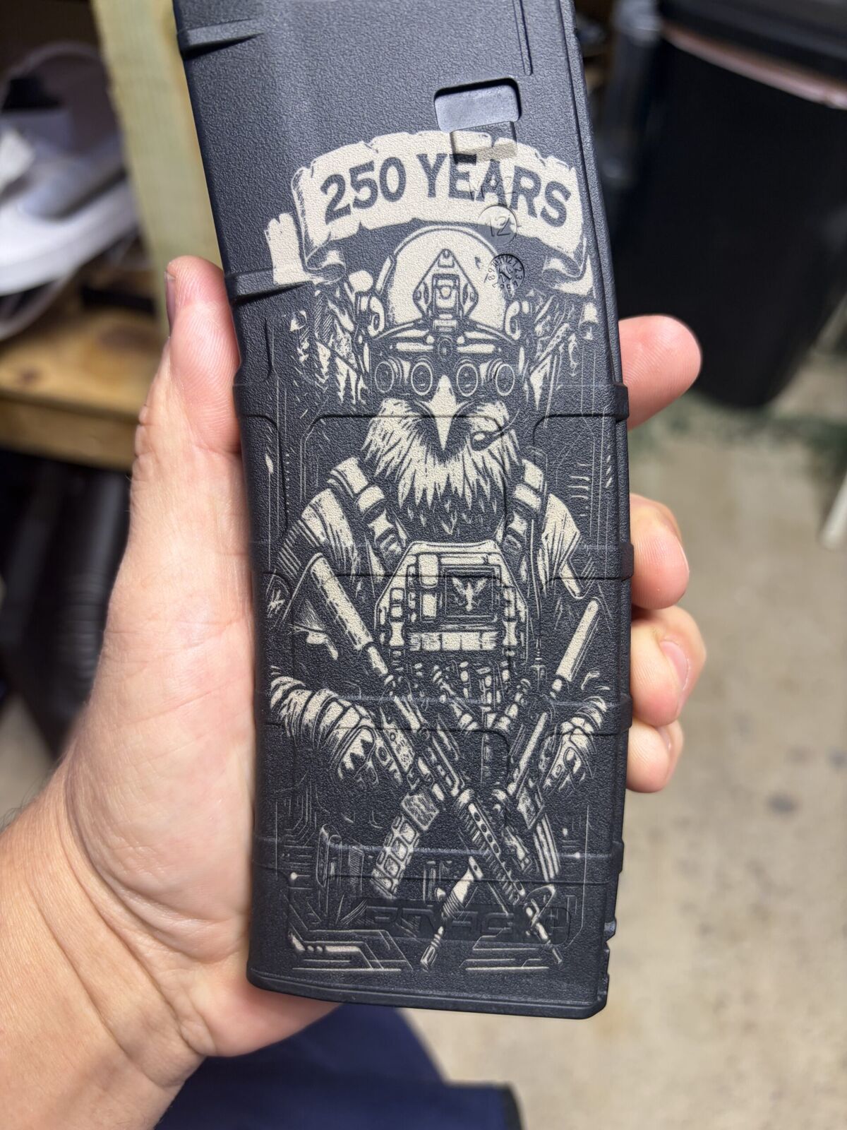 Eagle design laser-engraved on a PMAG magazine